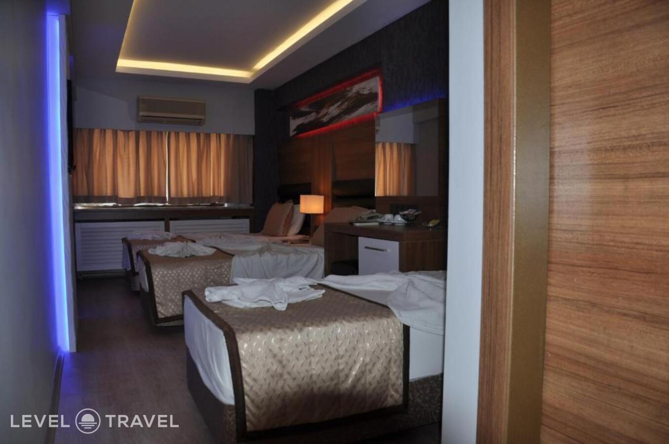 фотографии номера Трехместный номер отеля Otel Kabacam в Турция(Измир) - фото №6