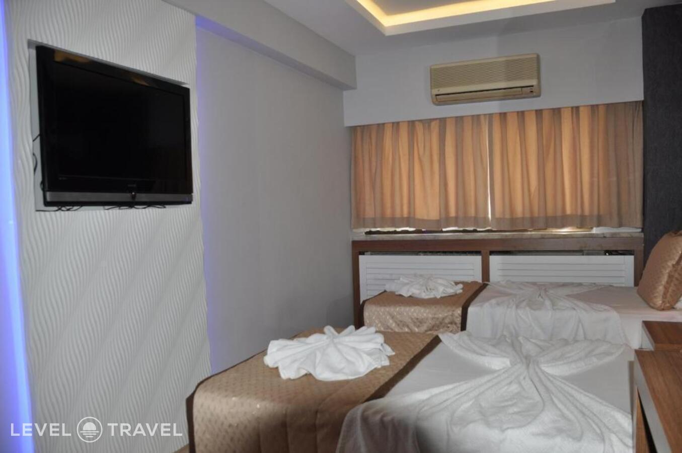 фотографии номера Трехместный номер отеля Otel Kabacam в Турция(Измир) - фото №29