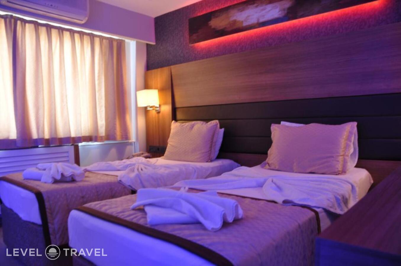 фотографии номера Трехместный номер отеля Otel Kabacam в Турция(Измир) - фото №9