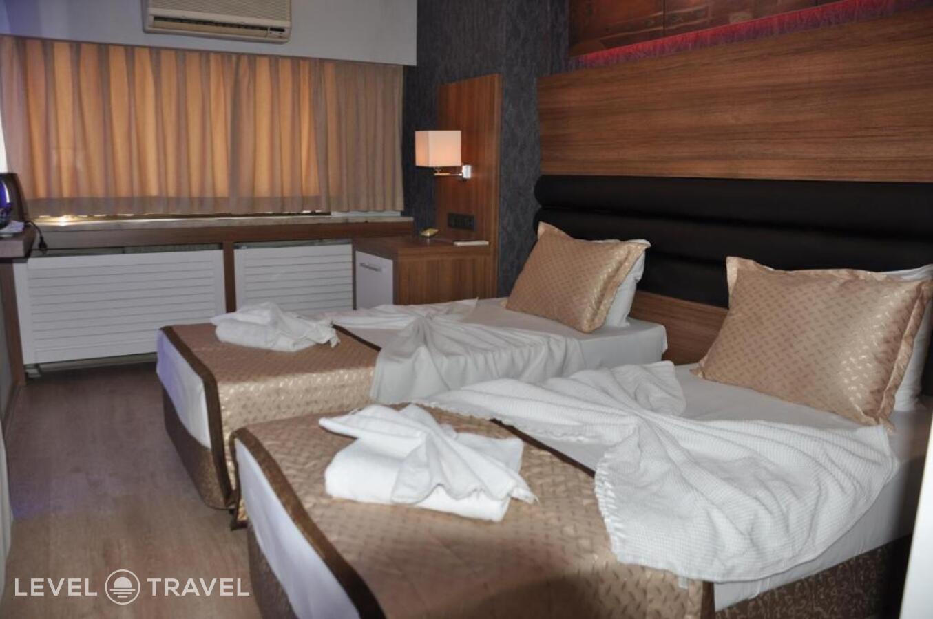 фотографии номера Трехместный номер отеля Otel Kabacam в Турция(Измир) - фото №25