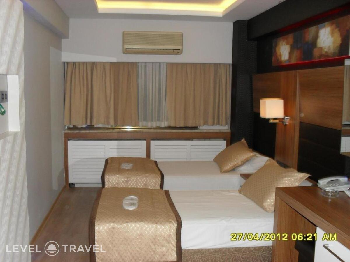 фотографии номера Трехместный номер отеля Otel Kabacam в Турция(Измир) - фото №4