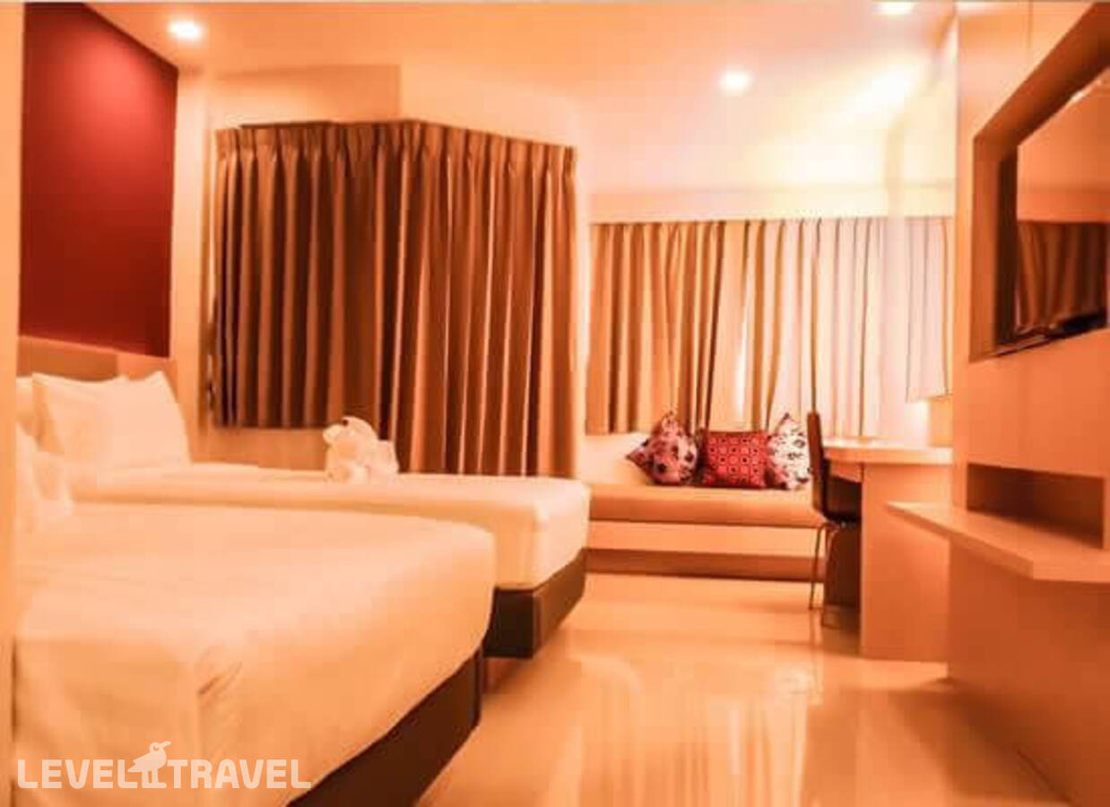фотографии номера Делюкс с видом на бассейн отеля Andatel Grande Hotel в Таиланд(Патонг Бич) - фото №1