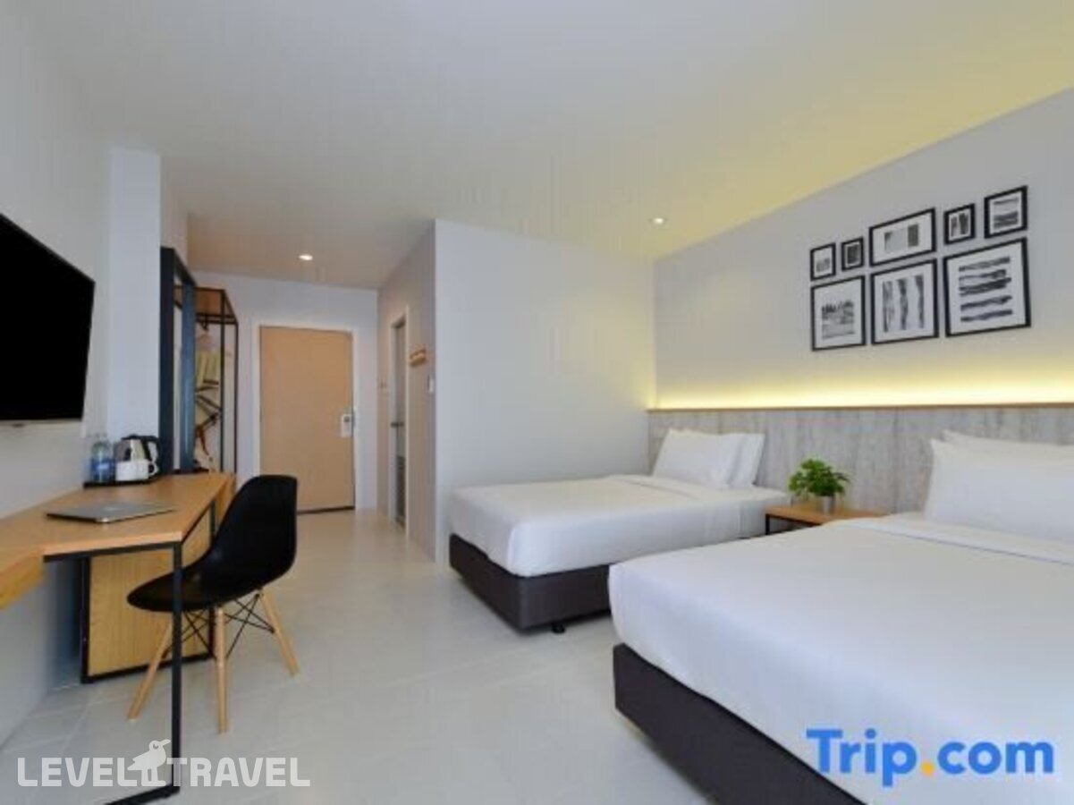 фотографии номера Трехместный улучшенный с видом на город отеля Ruenthip Residence Pattaya в Таиланд(Наклуа) - фото №2