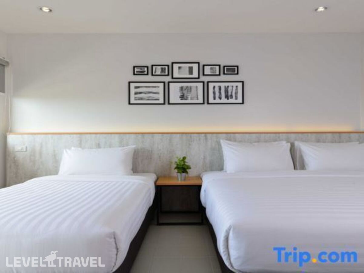 фотографии номера Трехместный улучшенный с видом на город отеля Ruenthip Residence Pattaya в Таиланд(Наклуа) - фото №3
