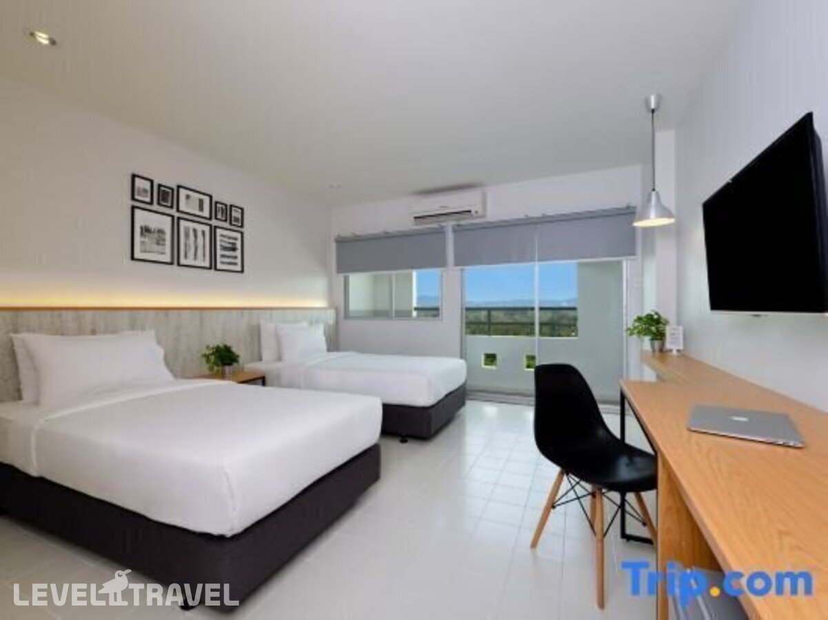фотографии номера Трехместный улучшенный с видом на город отеля Ruenthip Residence Pattaya в Таиланд(Наклуа) - фото №1