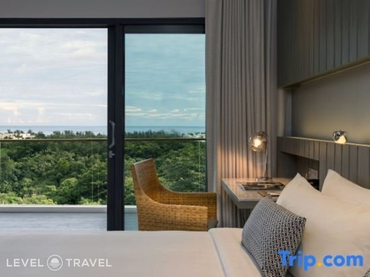 фотографии номера Стандартный (две односпальные кровати) отеля Ikon Phuket в Таиланд(Карон Бич) - фото №5