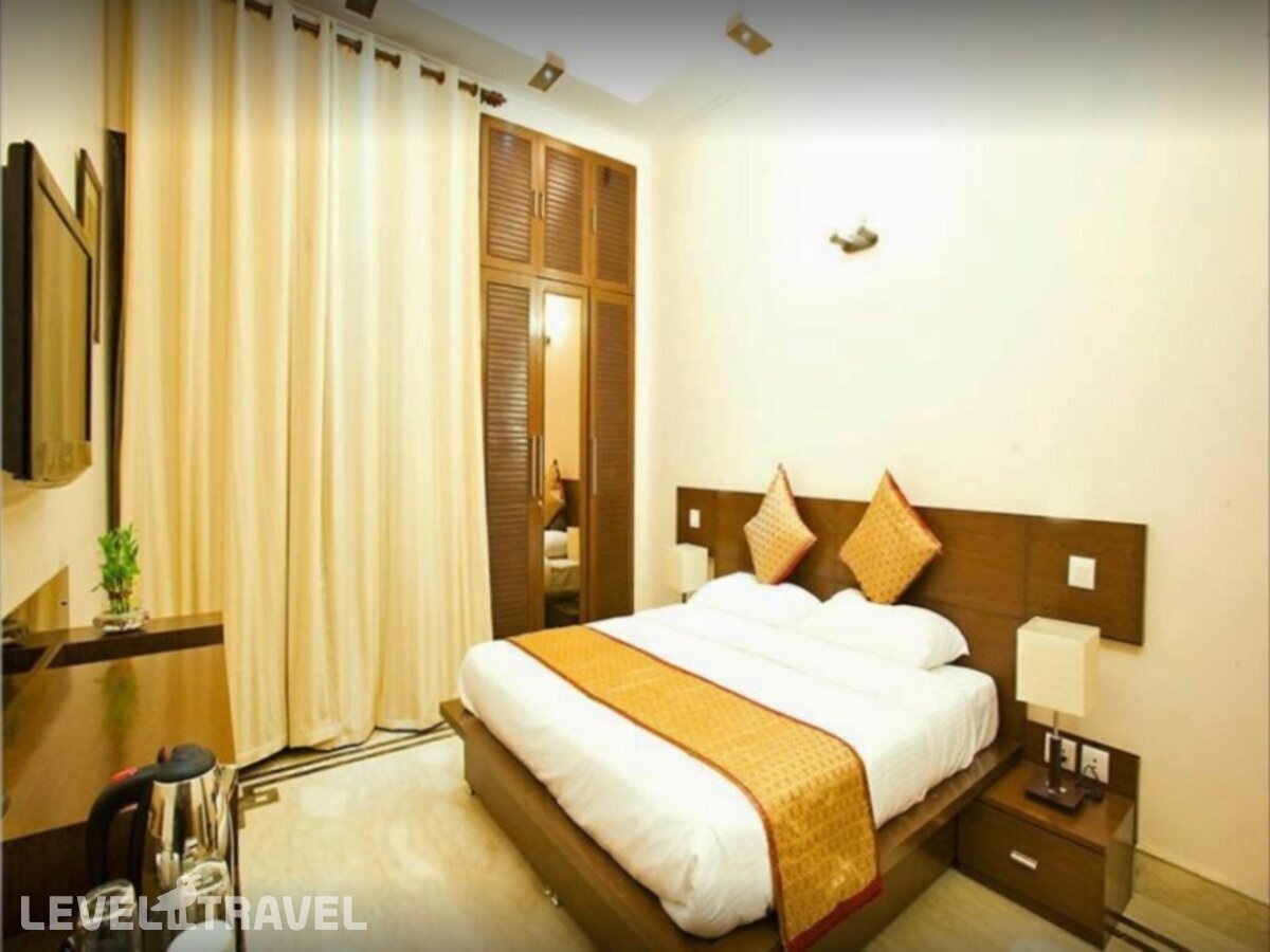 фотографии номера Стандартный номер отеля Evergreen Suites Defence Colony в Индия(Нью-Дели) - фото №1