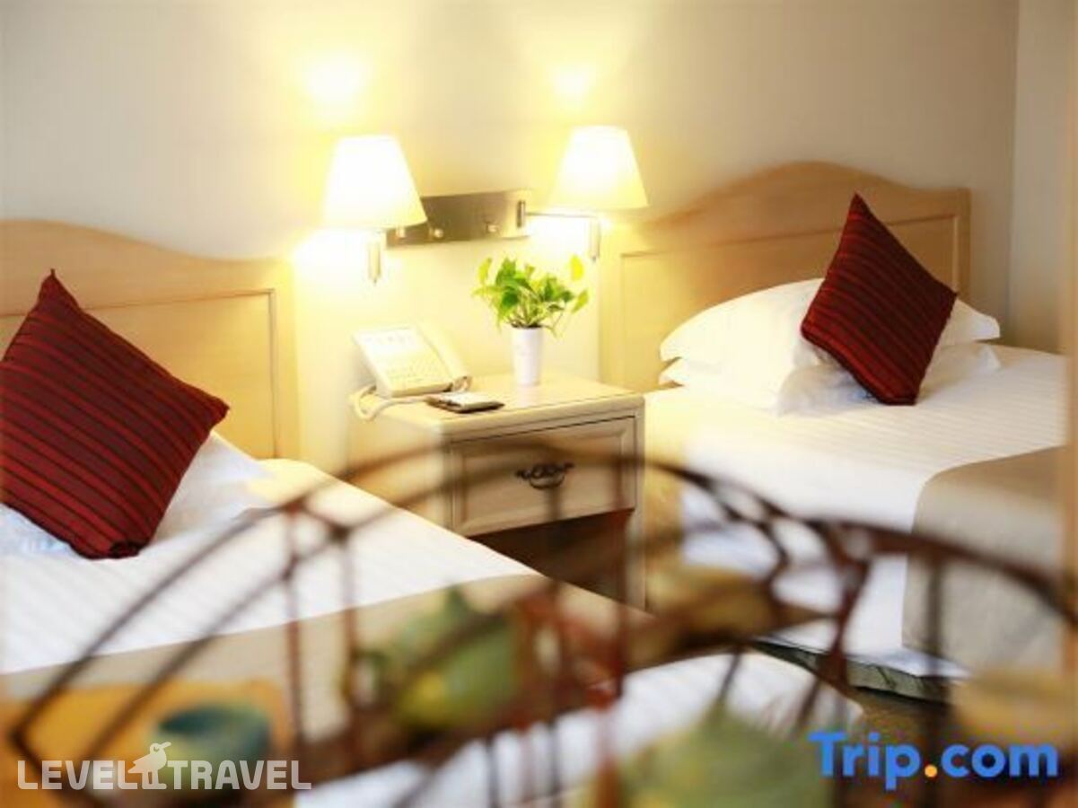 фотографии номера Улучшенный (две односпальные кровати) отеля Jinglun Hotel в Китай(Пекин) - фото №1
