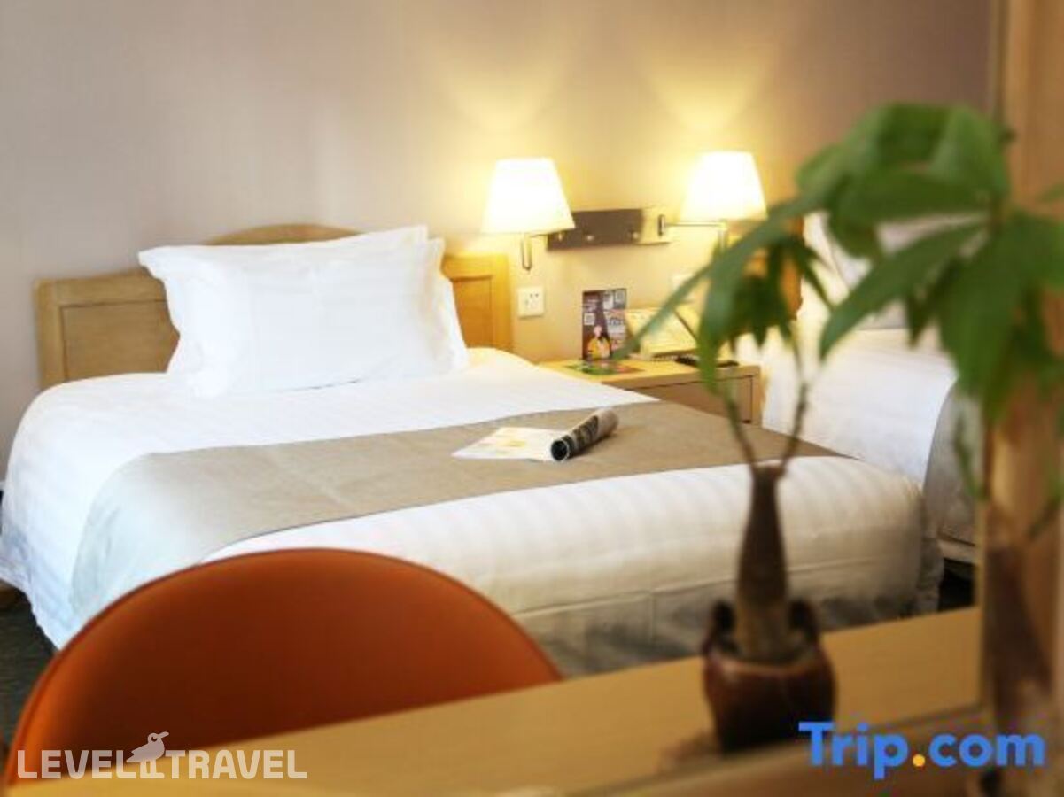 фотографии номера Улучшенный (две односпальные кровати) отеля Jinglun Hotel в Китай(Пекин) - фото №3