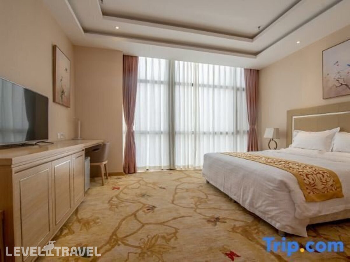 фотографии номера Стандартный номер отеля Dajiaoting International Business Hotel в Китай(Пекин) - фото №1