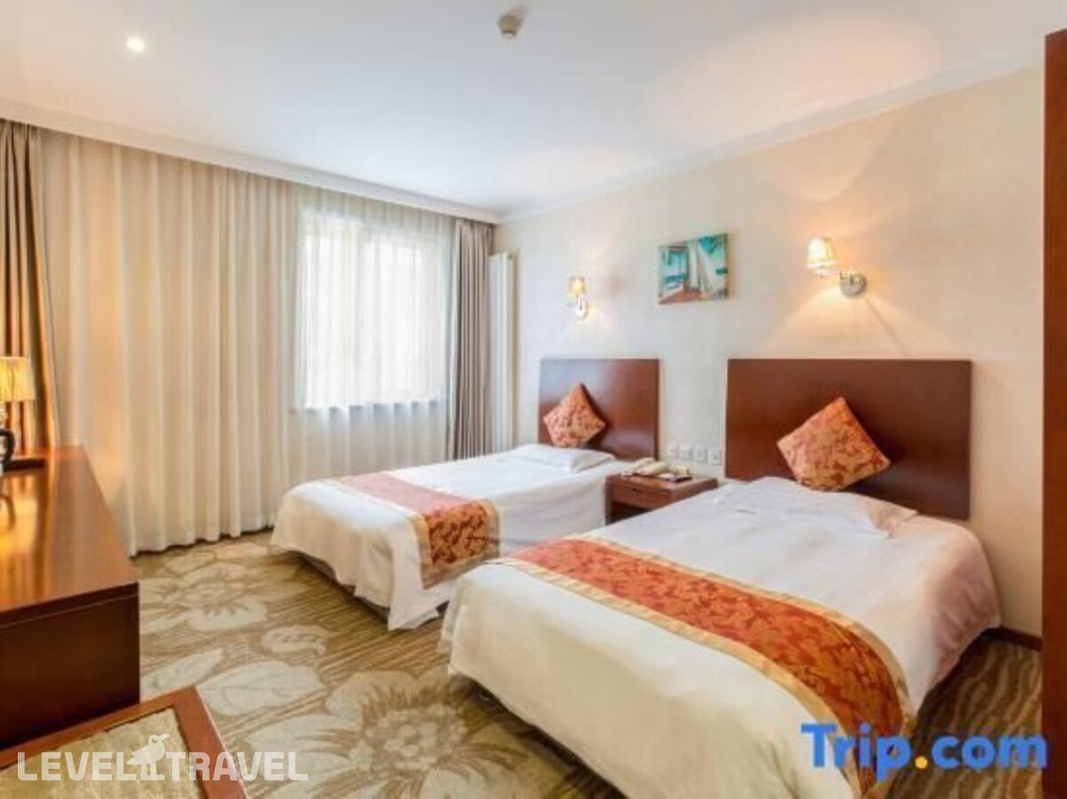 фотографии номера Стандартный номер отеля Dajiaoting International Business Hotel в Китай(Пекин) - фото №2
