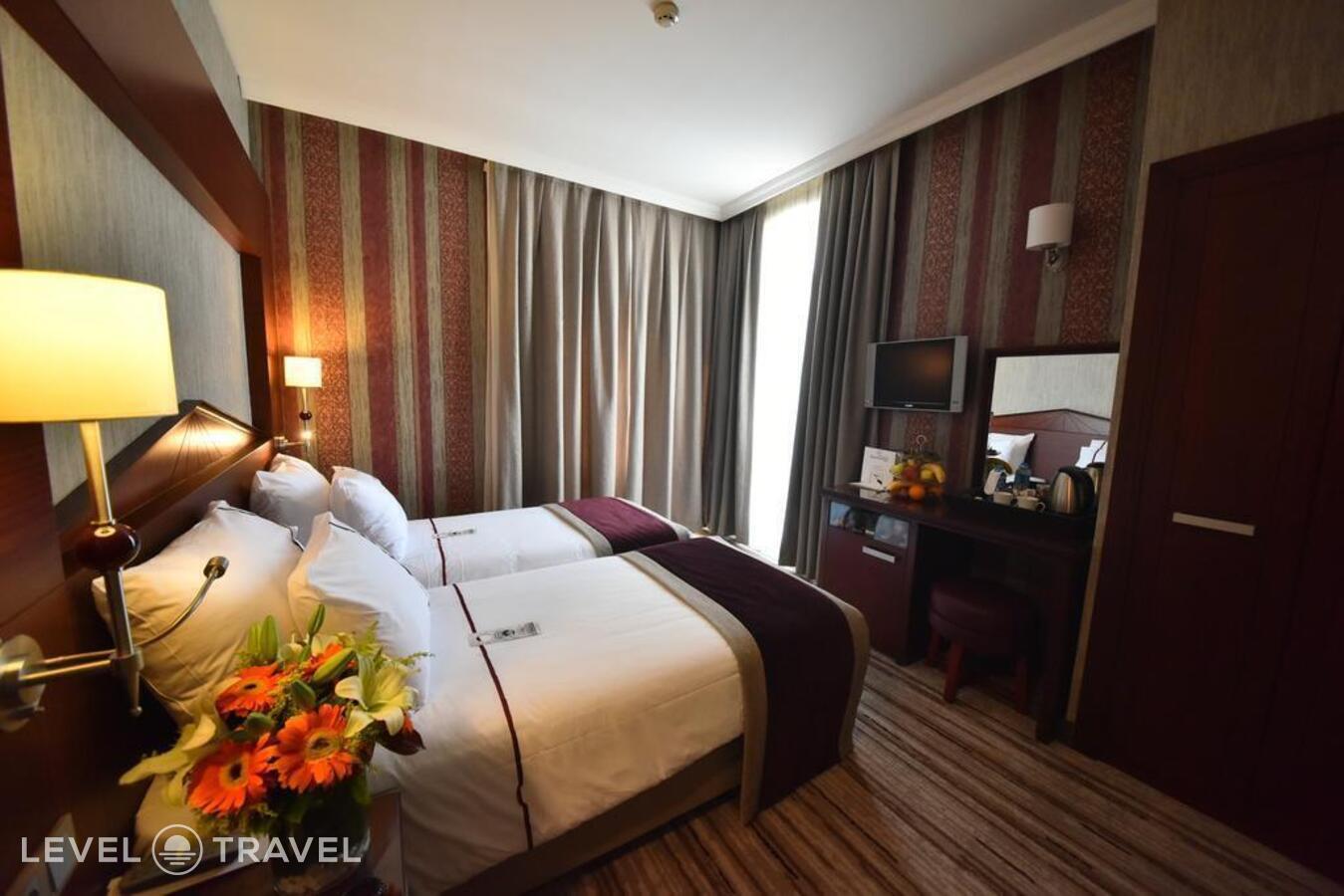 фотографии номера Стандартный (две односпальные кровати) отеля Taksim Gonen Hotel в Турция(Бейоглу) - фото №3