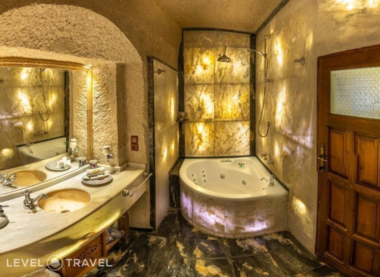 фотографии номера Стандартный (две односпальные кровати) отеля Gamirasu Cave Hotel в Турция(Ургюп) - фото №3