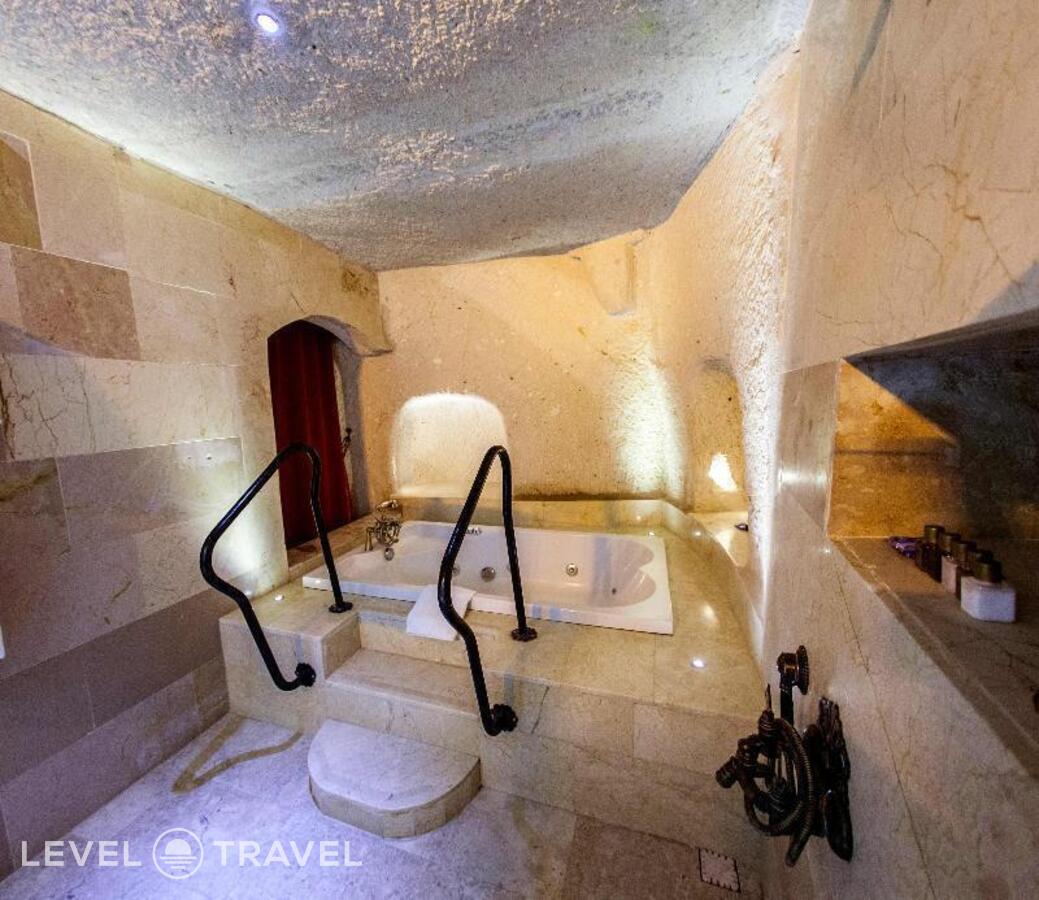 фотографии номера Стандартный (две односпальные кровати) отеля Gamirasu Cave Hotel в Турция(Ургюп) - фото №2
