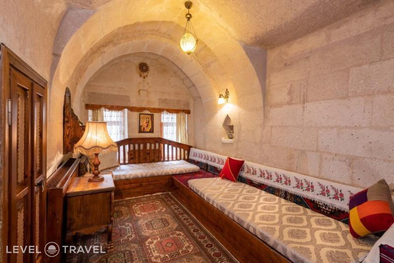 фотографии номера Стандартный (две односпальные кровати) отеля Gamirasu Cave Hotel в Турция(Ургюп) - фото №6