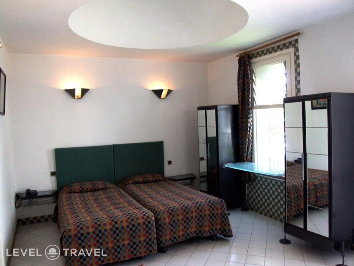 фотографии номера Стандартный (две односпальные кровати) отеля Appart Hotel Tagadirt в Марокко(Агадир) - фото №1