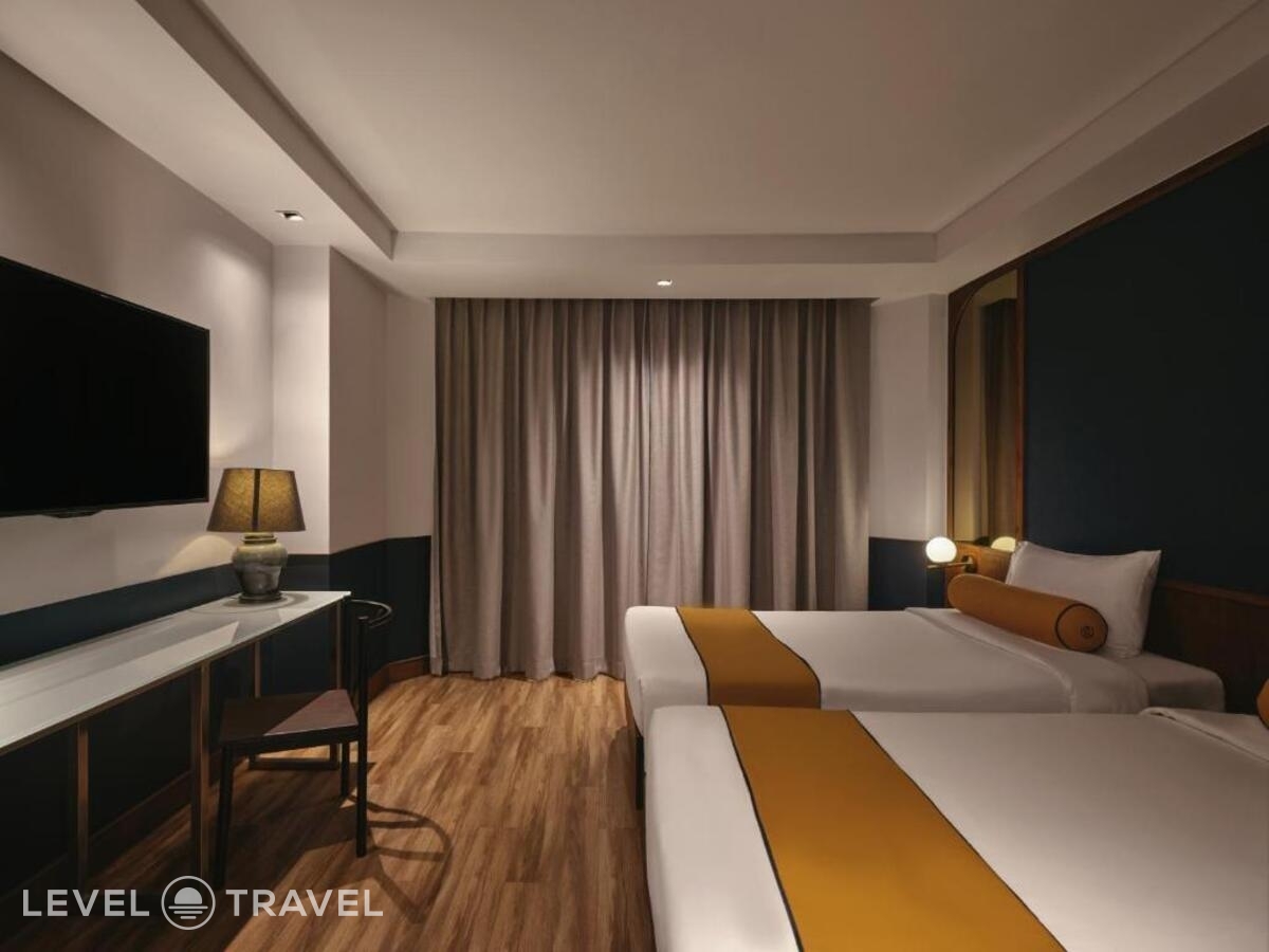 фотографии номера Улучшенный (две односпальные кровати) отеля Graph Hotel (Ex. Bangkok Chada Hotel) в Таиланд(Бангкок) - фото №1