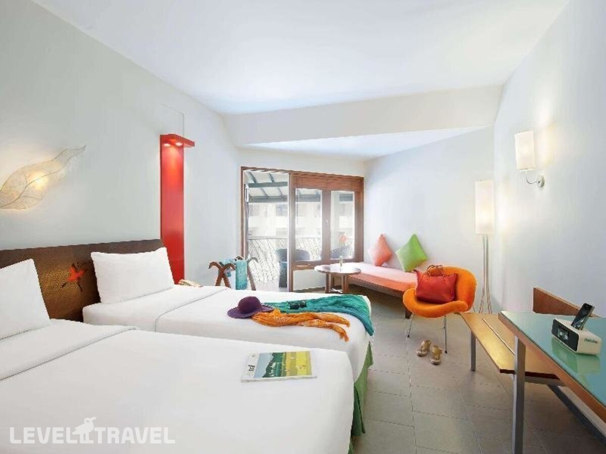 фотографии номера Стандартный (две односпальные кровати) отеля Ibis Styles Bali Legian (Ex. All Seasons Bali Legian) в Индонезия(Легиан) - фото №2