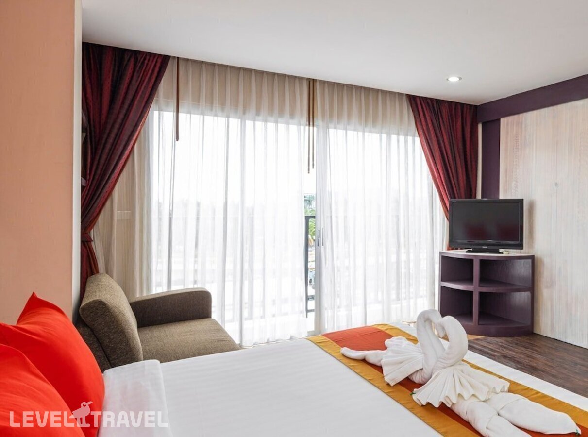 фотографии номера Семейный номер отеля Malin Patong Hotel в Таиланд(Патонг Бич) - фото №9