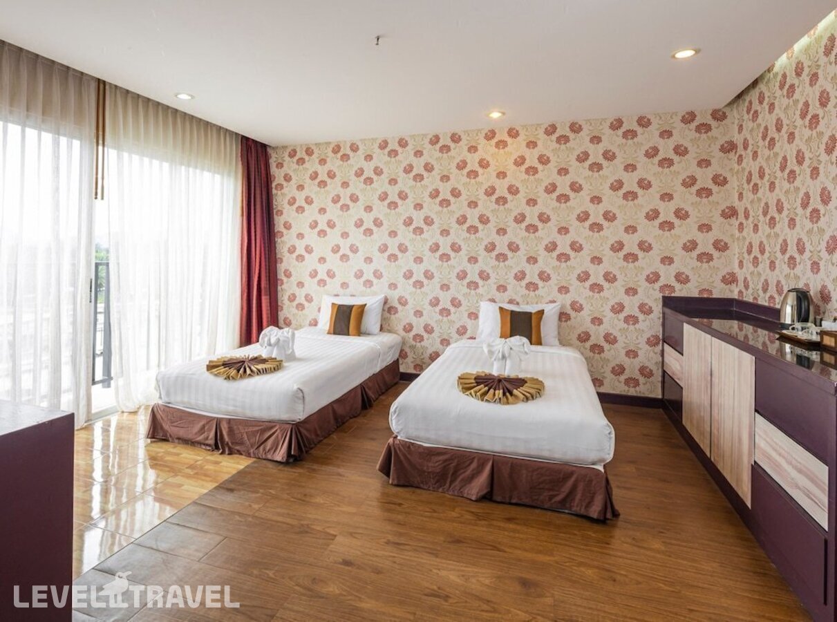 фотографии номера Семейный номер отеля Malin Patong Hotel в Таиланд(Патонг Бич) - фото №6