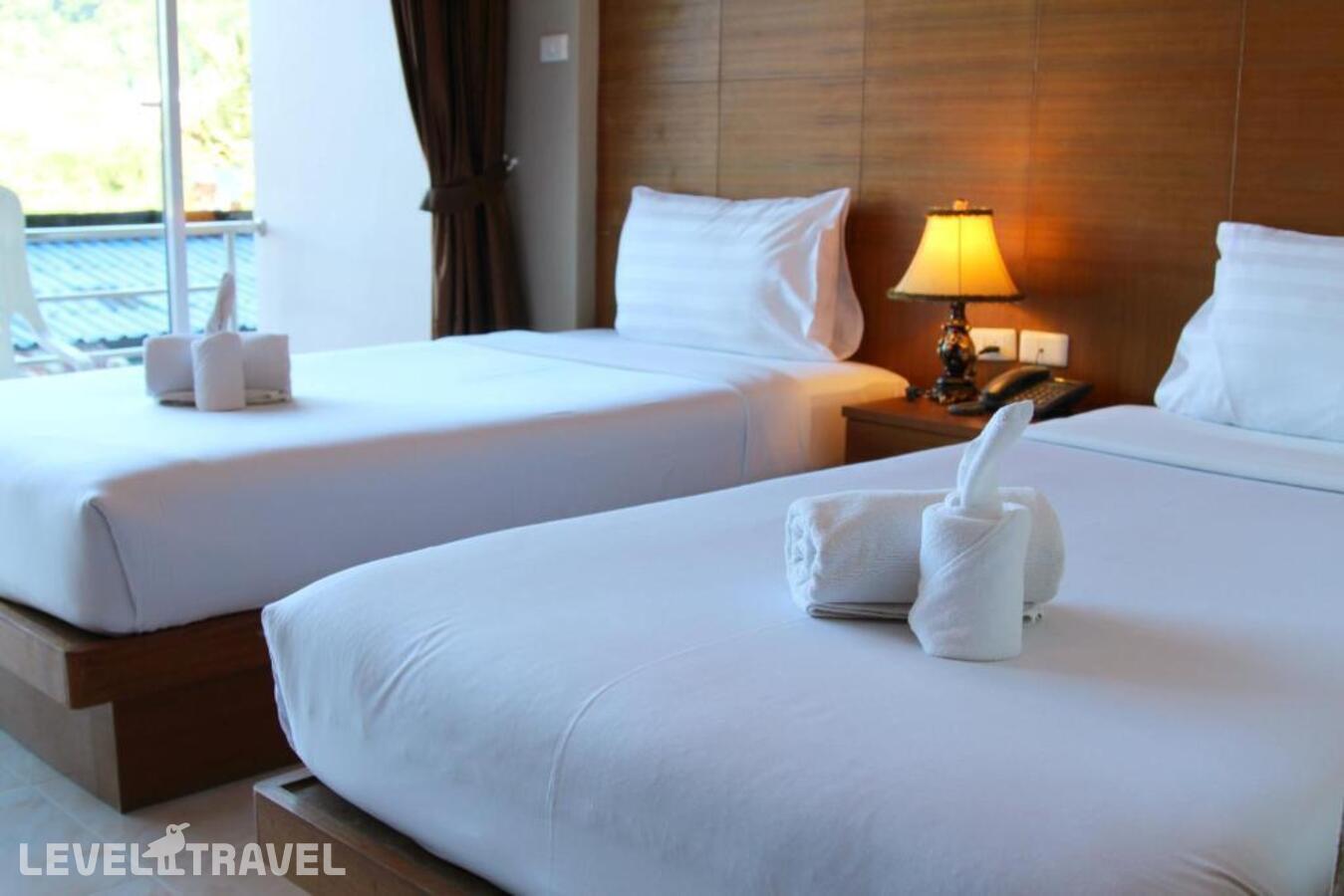 фотографии номера Стандартный (две односпальные кровати) отеля Good Nice Hotel в Таиланд(Патонг Бич) - фото №7