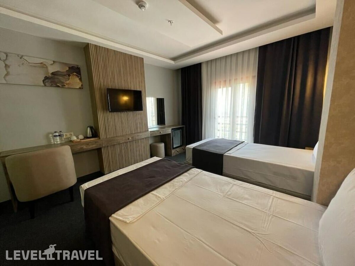 фотографии номера Стандартный (две односпальные кровати) отеля Sevcan Hotel в Турция(Бакыркёй) - фото №5