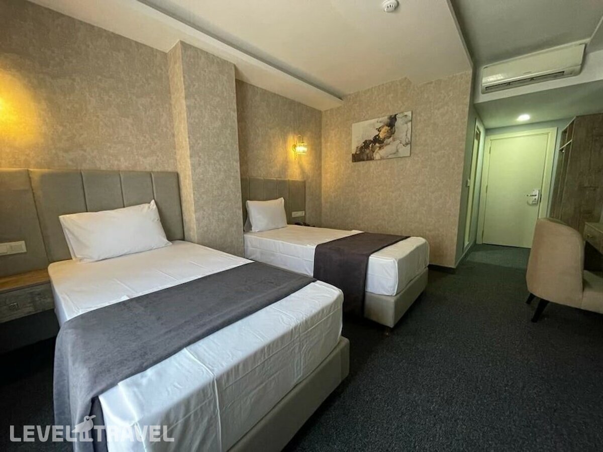 фотографии номера Стандартный (две односпальные кровати) отеля Sevcan Hotel в Турция(Бакыркёй) - фото №2