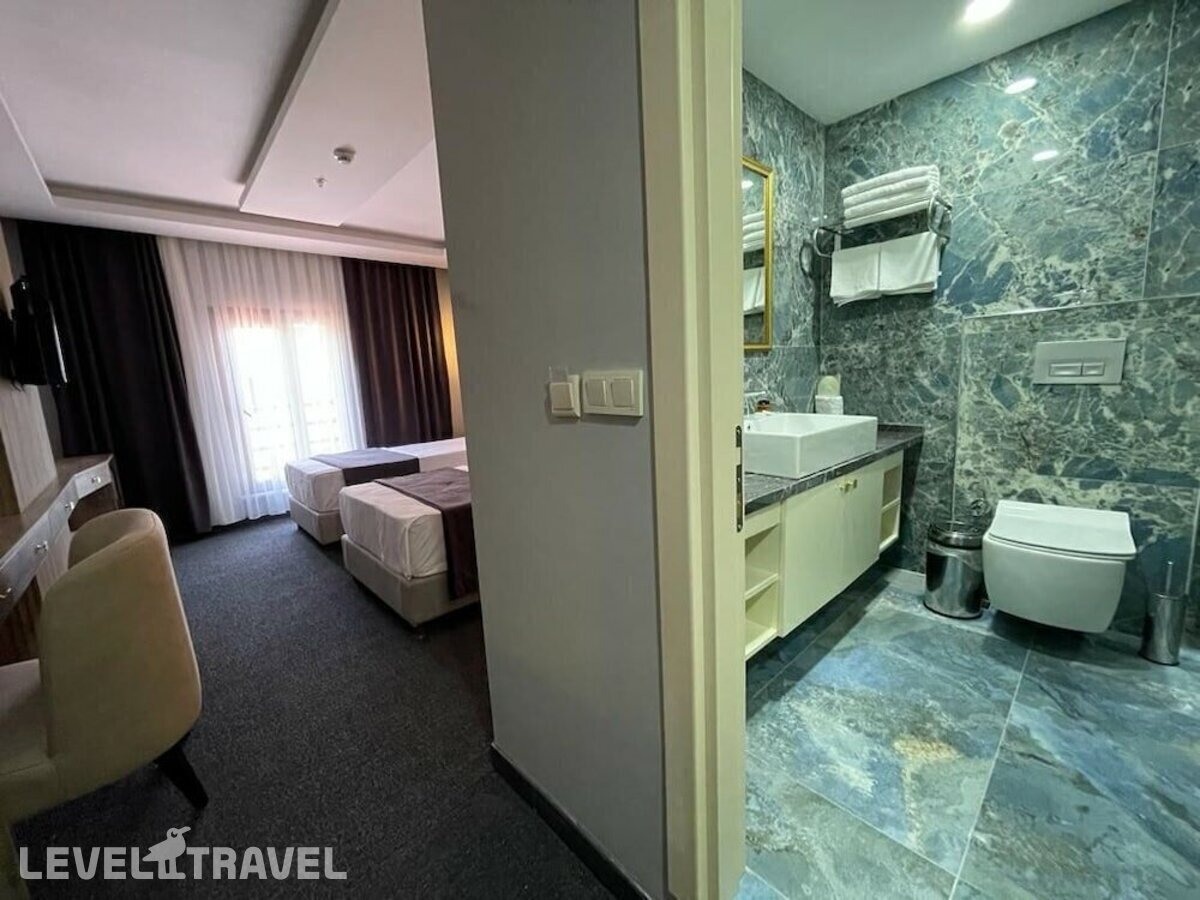 фотографии номера Стандартный (две односпальные кровати) отеля Sevcan Hotel в Турция(Бакыркёй) - фото №7