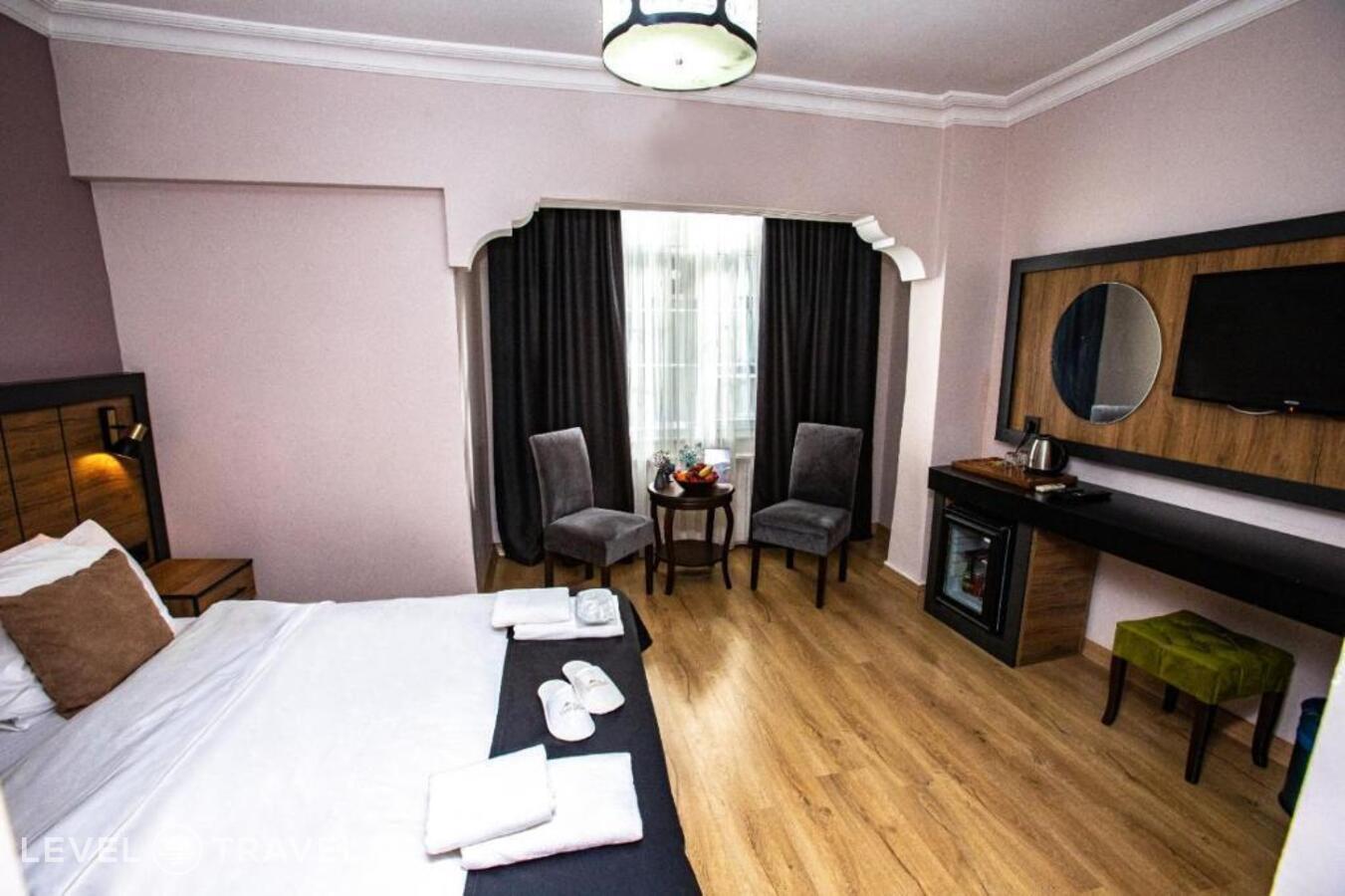 фотографии номера Семейный роскошный люкс отеля Comfort Hotel Taksim в Турция(Бейоглу) - фото №4