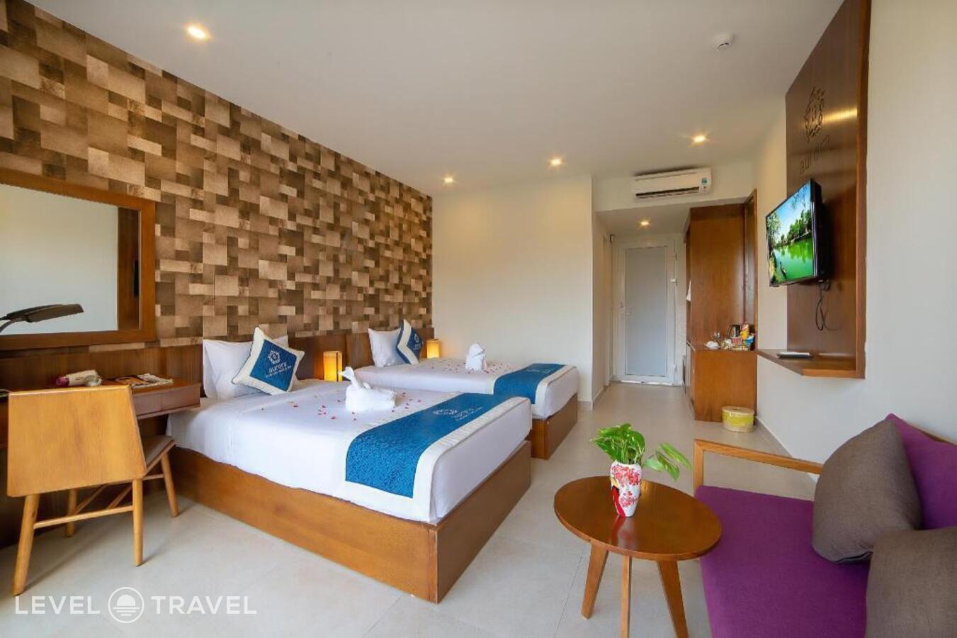 фотографии номера Делюкс (две односпальные кровати) отеля Aurora Riverside Hotel (Ex. Phuoc An River Hotel) в Вьетнам(Хойан) - фото №1