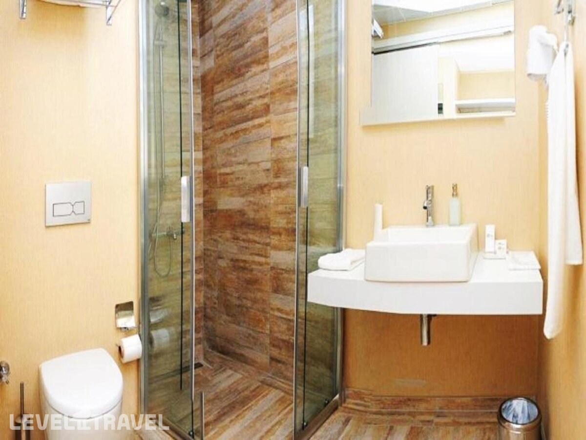 фотографии номера Стандартный (две односпальные кровати) отеля Tempo Hotel 4 в Турция(Кягытхане) - фото №1