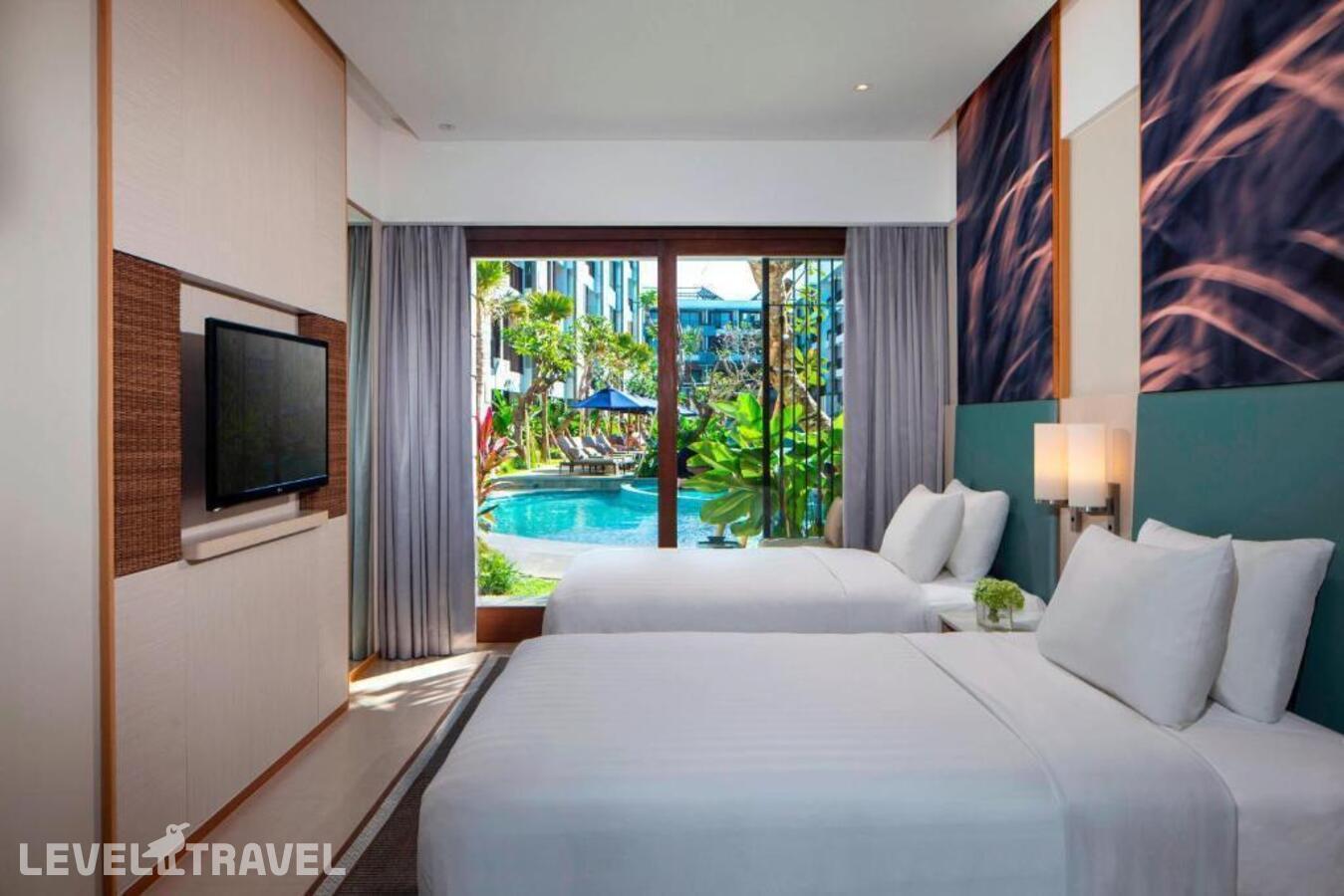 фотографии номера Делюкс (две односпальные кровати) отеля Courtyard By Marriott Bali Seminyak в Индонезия(Семиньяк) - фото №1