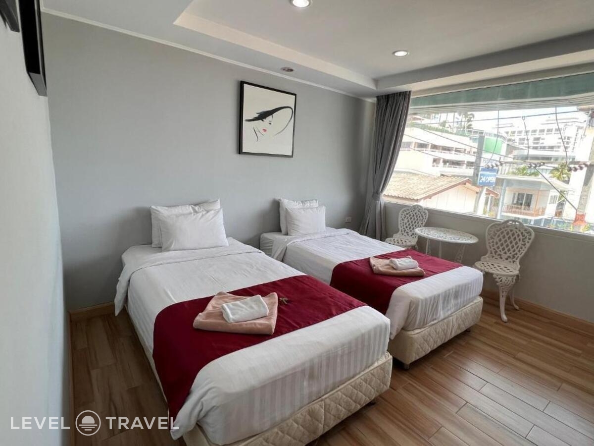 фотографии номера Делюкс (две односпальные кровати) отеля The Beach Front Resort в Таиланд(Центральная Паттайя) - фото №3