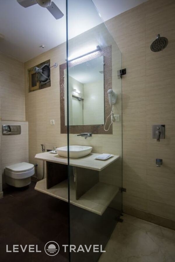 фотографии номера Делюкс отеля Suncourt Yatri Hotel в Индия(Нью-Дели) - фото №7