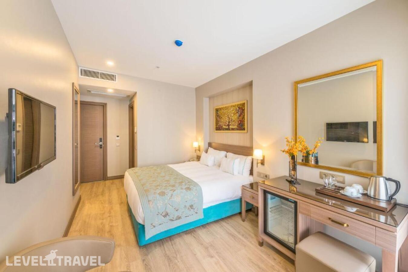 фотографии номера Делюкс (две односпальные кровати) отеля Taximist Hotel в Турция(Бейоглу) - фото №3