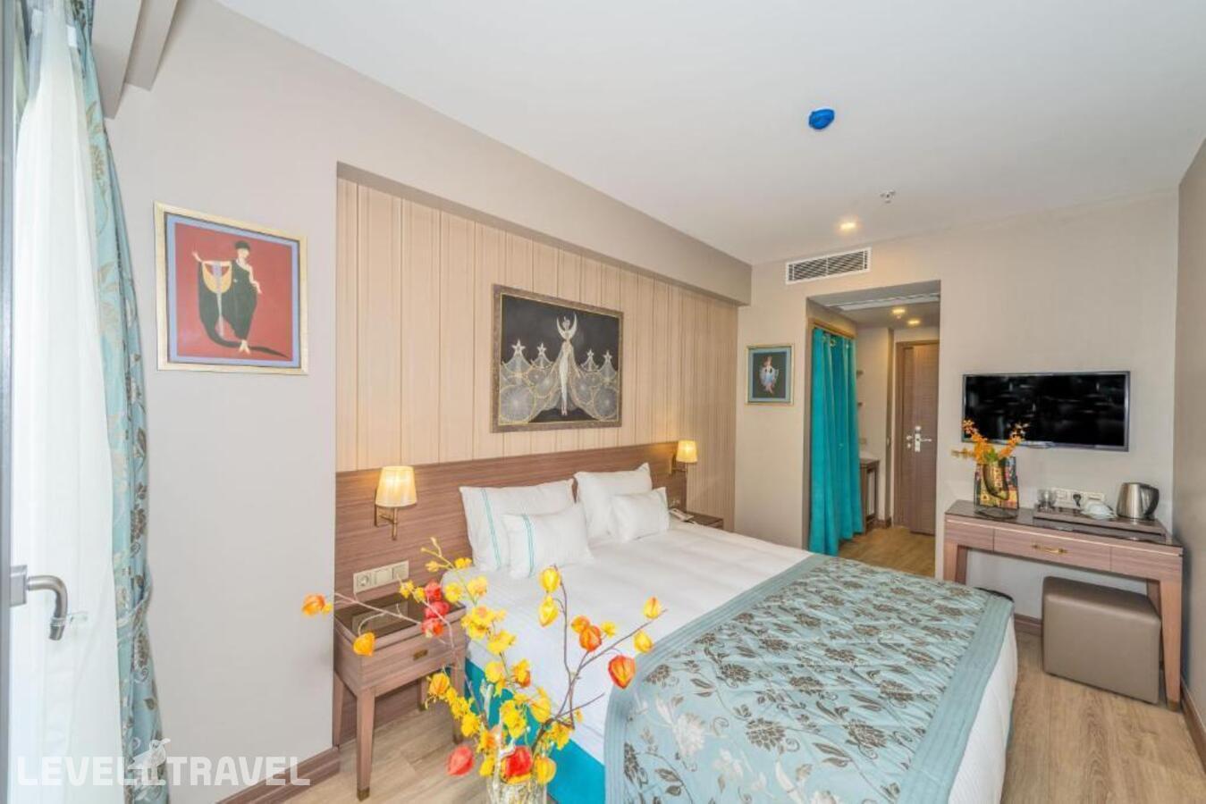 фотографии номера Делюкс (две односпальные кровати) отеля Taximist Hotel в Турция(Бейоглу) - фото №1