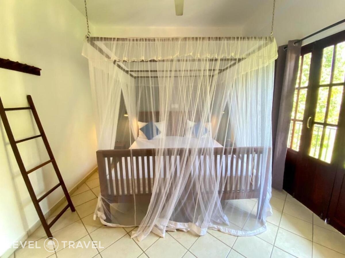 фотографии номера Делюкс (две односпальные кровати) отеля Nor Lanka Hotel в Шри-Ланка(Унаватуна) - фото №3