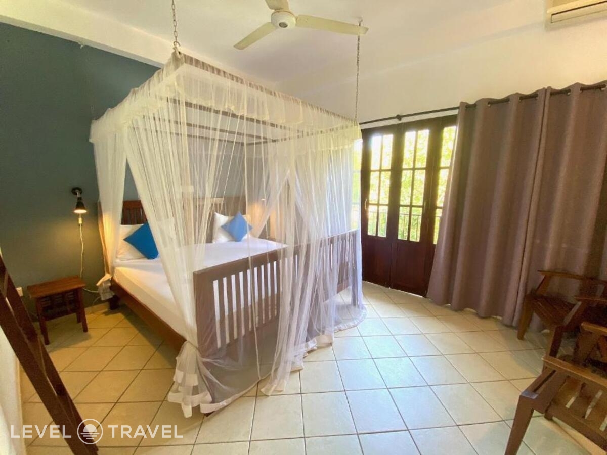 фотографии номера Делюкс (две односпальные кровати) отеля Nor Lanka Hotel в Шри-Ланка(Унаватуна) - фото №1
