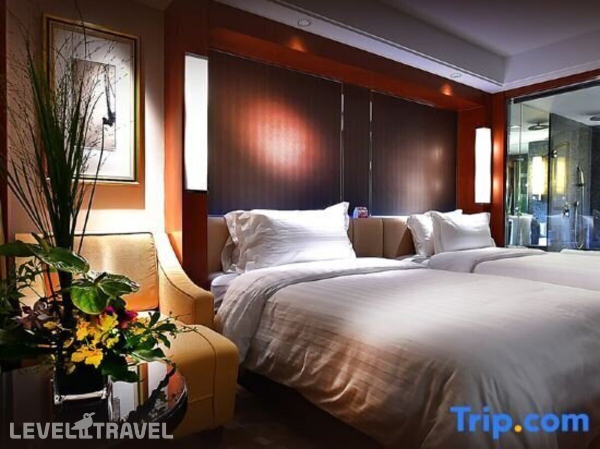 фотографии номера Улучшенный (две односпальные кровати) отеля Beijing International Hotel в Китай(Пекин) - фото №6