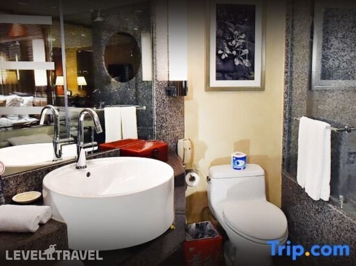 фотографии номера Улучшенный (две односпальные кровати) отеля Beijing International Hotel в Китай(Пекин) - фото №10