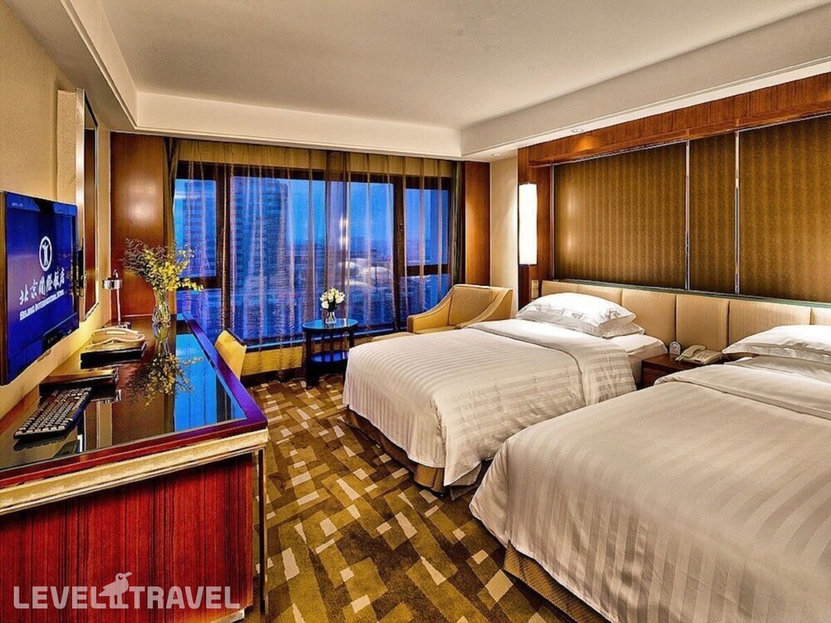 фотографии номера Улучшенный (две односпальные кровати) отеля Beijing International Hotel в Китай(Пекин) - фото №1