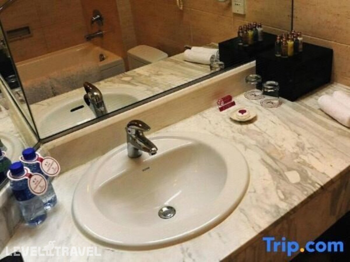 фотографии номера Улучшенный (две односпальные кровати) отеля Beijing International Hotel в Китай(Пекин) - фото №11
