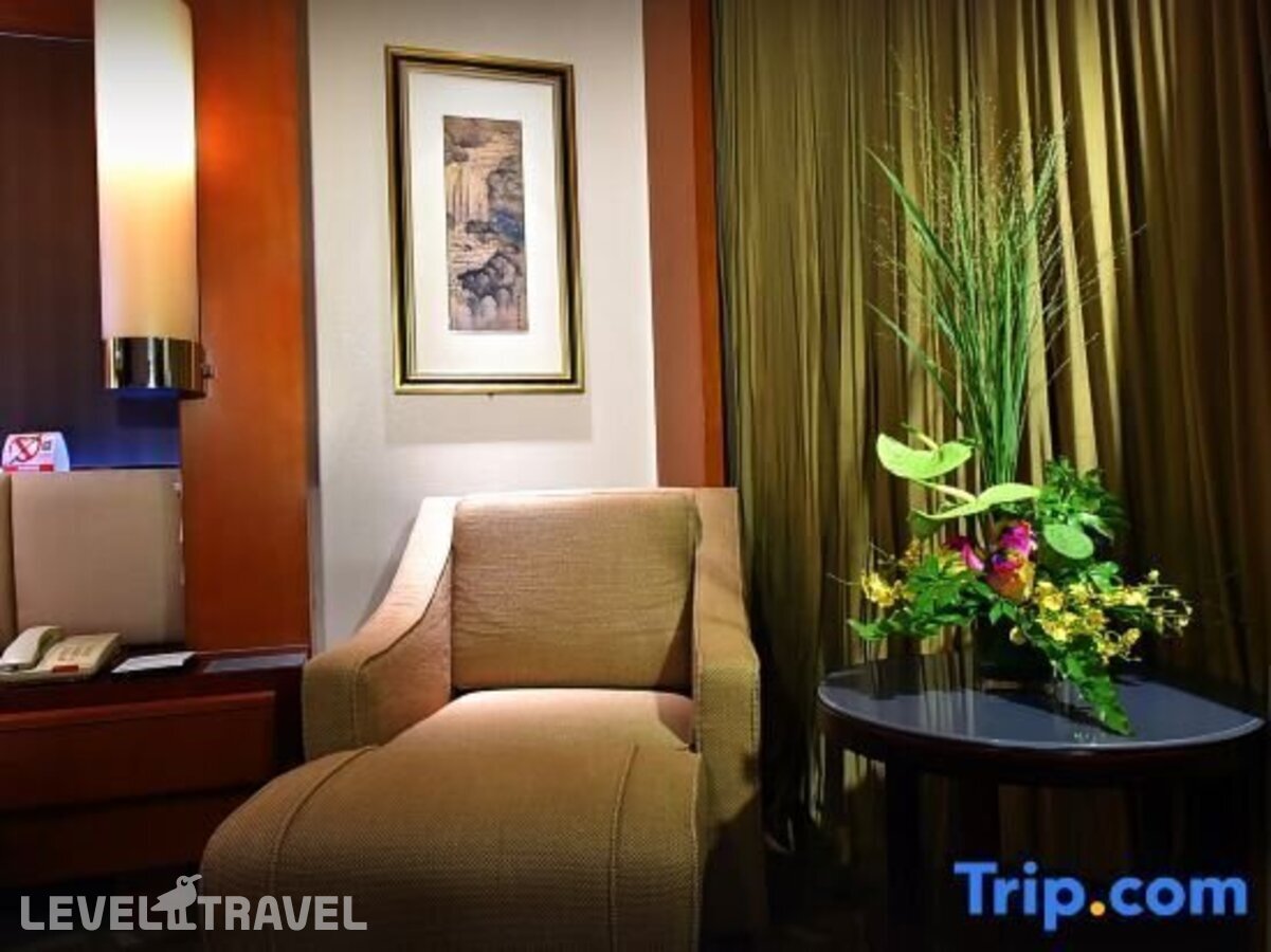 фотографии номера Улучшенный (две односпальные кровати) отеля Beijing International Hotel в Китай(Пекин) - фото №7