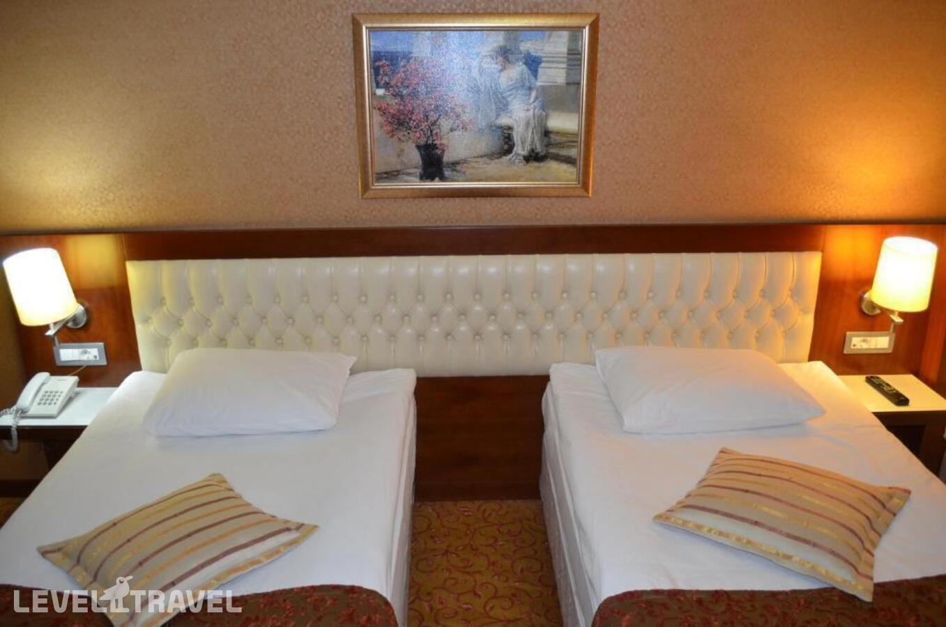 фотографии номера Стандартный (две односпальные кровати) отеля Yuksel Hotel в Турция(Фатих) - фото №14