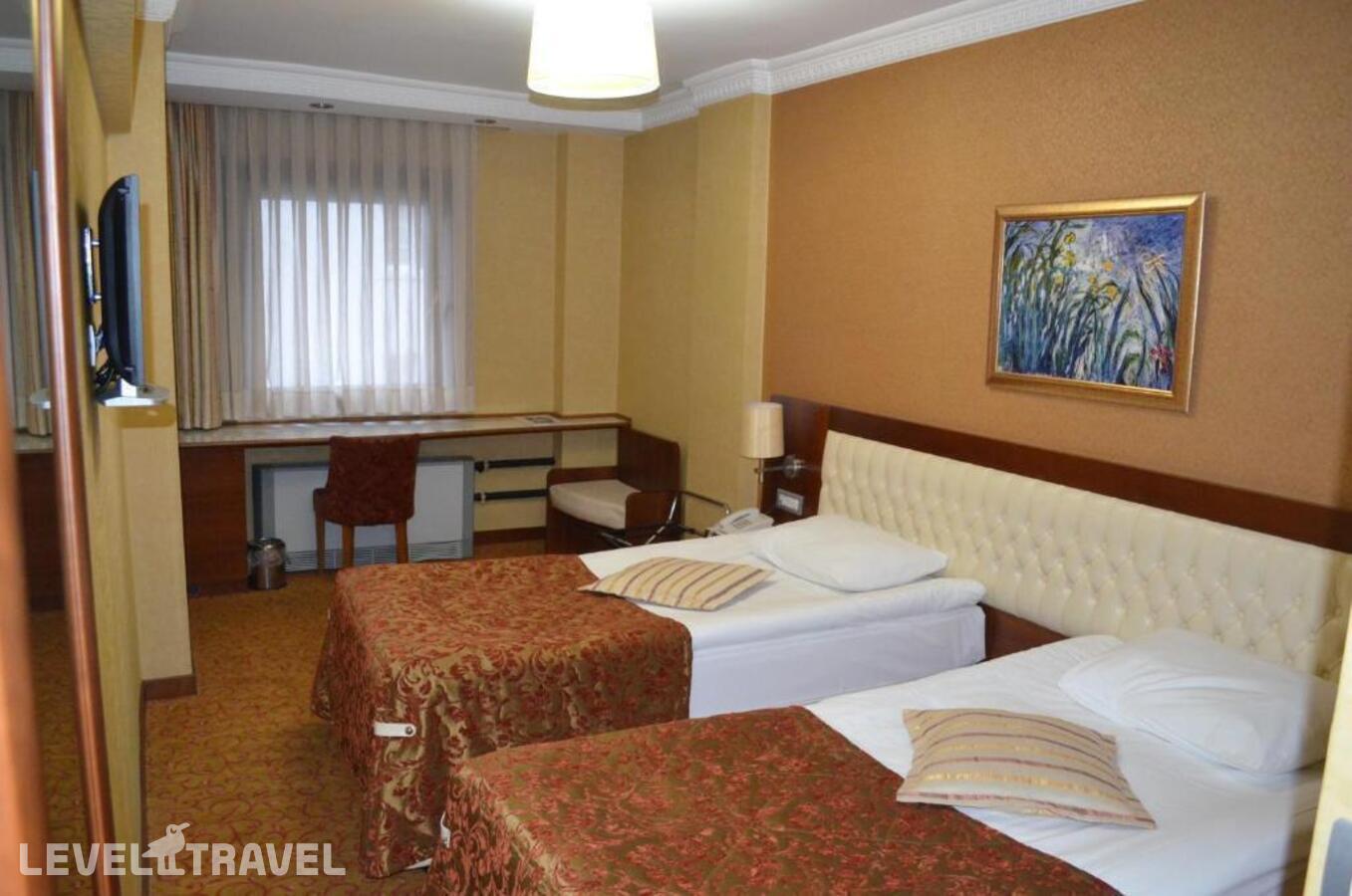 фотографии номера Стандартный (две односпальные кровати) отеля Yuksel Hotel в Турция(Фатих) - фото №11