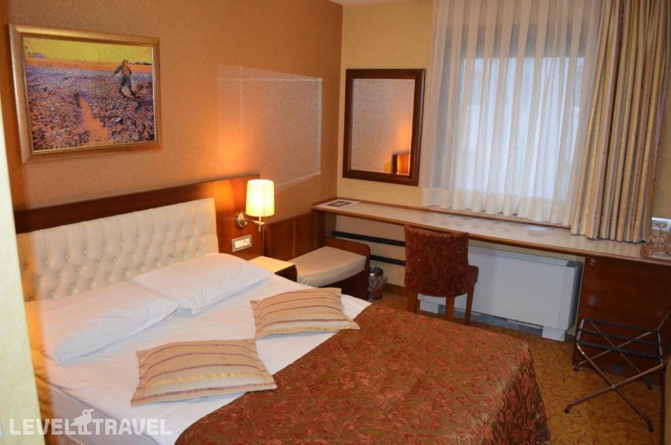 фотографии номера Стандартный (две односпальные кровати) отеля Yuksel Hotel в Турция(Фатих) - фото №12