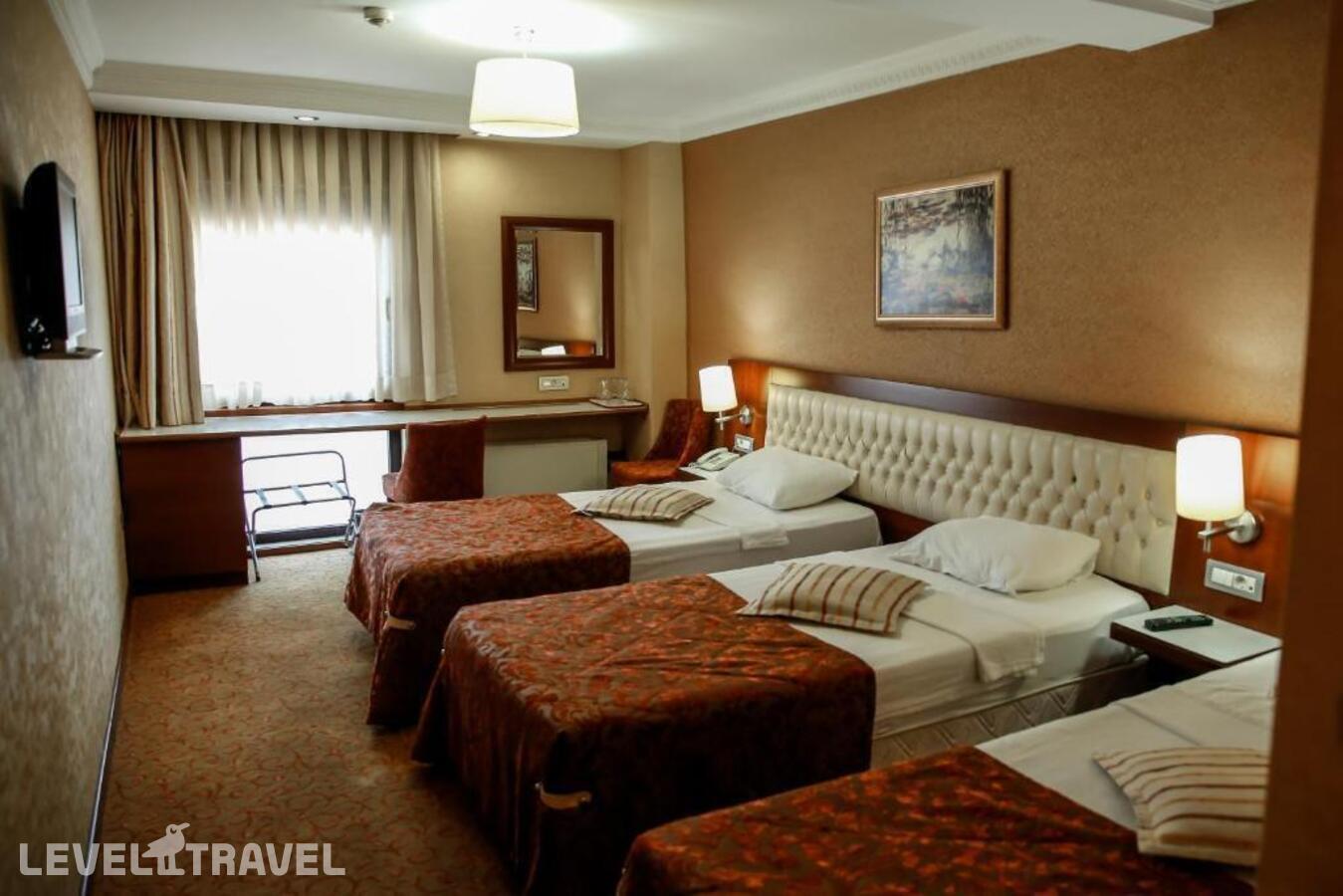 фотографии номера Стандартный (две односпальные кровати) отеля Yuksel Hotel в Турция(Фатих) - фото №6