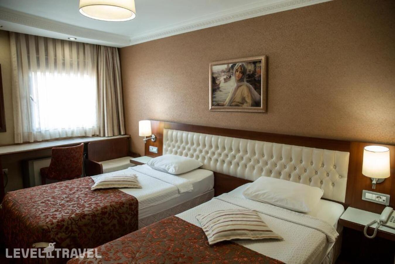 фотографии номера Стандартный (две односпальные кровати) отеля Yuksel Hotel в Турция(Фатих) - фото №4