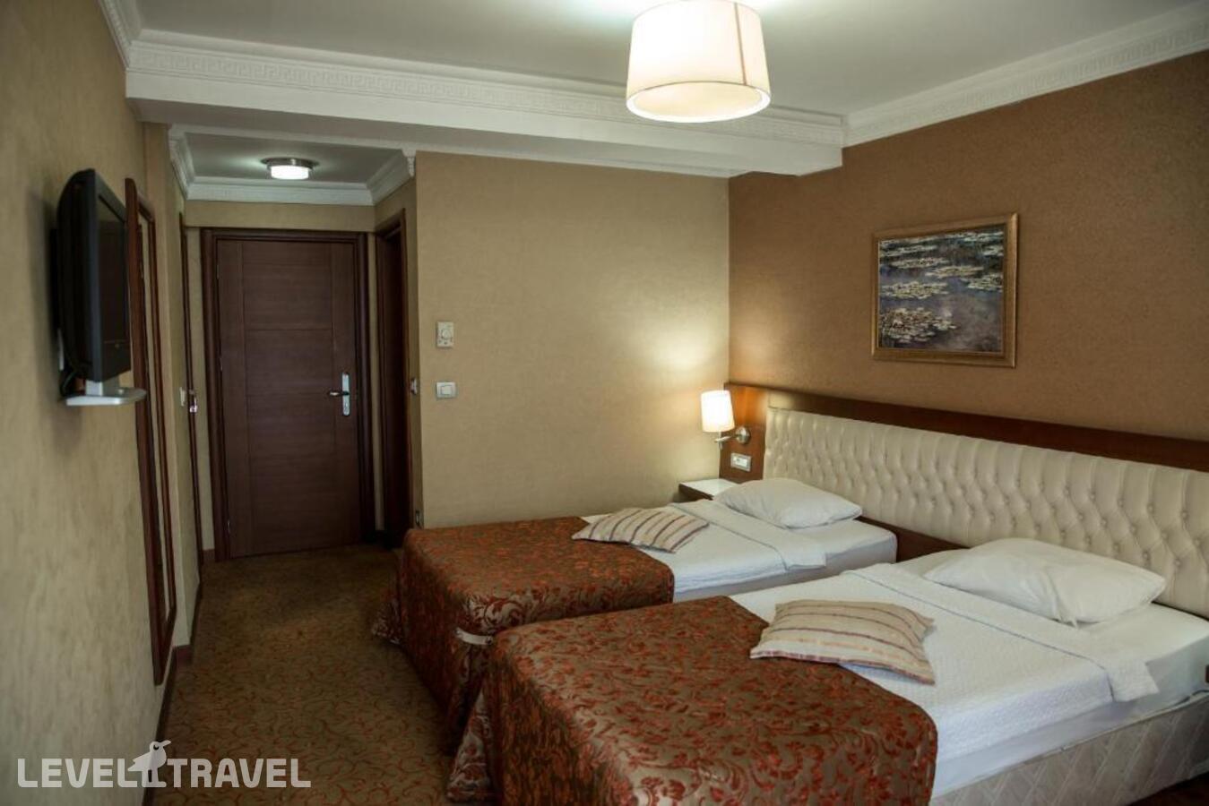 фотографии номера Стандартный (две односпальные кровати) отеля Yuksel Hotel в Турция(Фатих) - фото №2