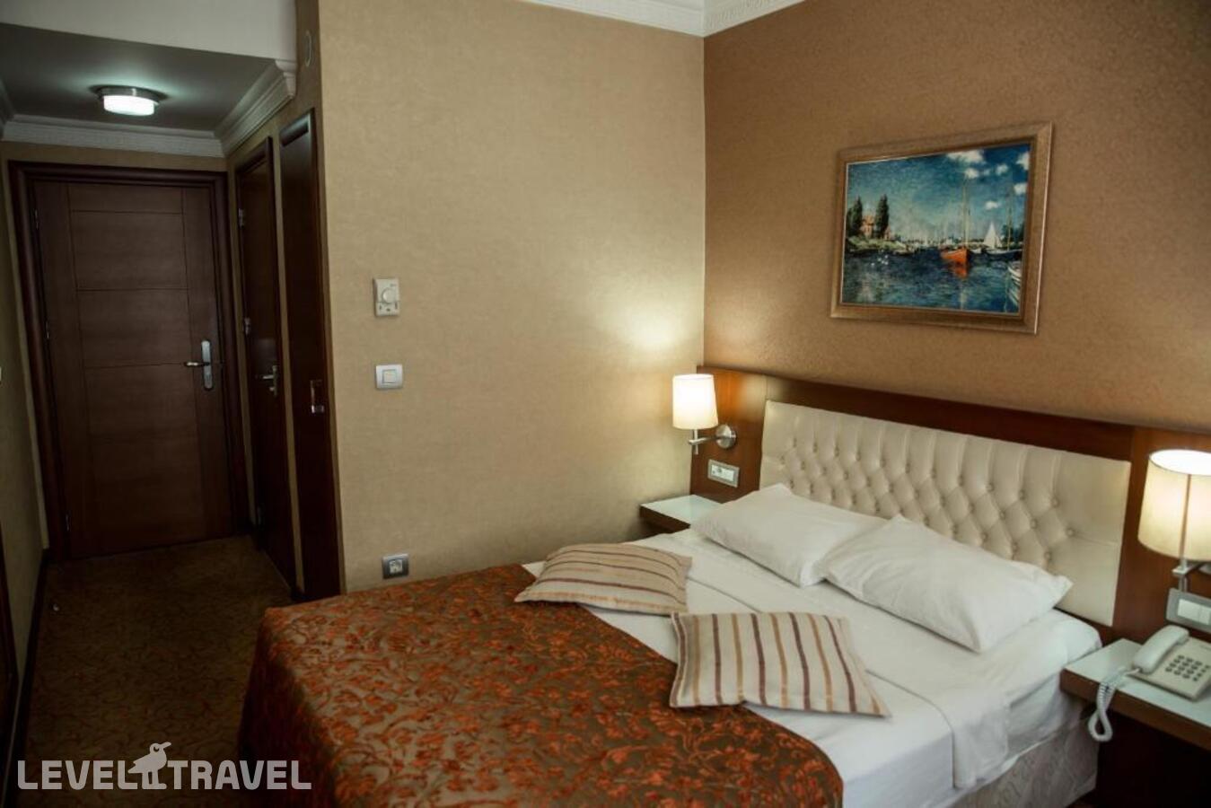 фотографии номера Стандартный (две односпальные кровати) отеля Yuksel Hotel в Турция(Фатих) - фото №5